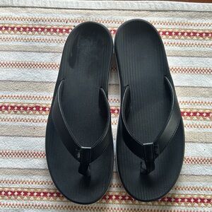 Brand new Nike flip-flops